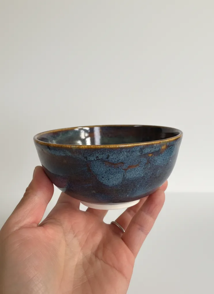 Aurora Glaze ceramic bowl - handheld