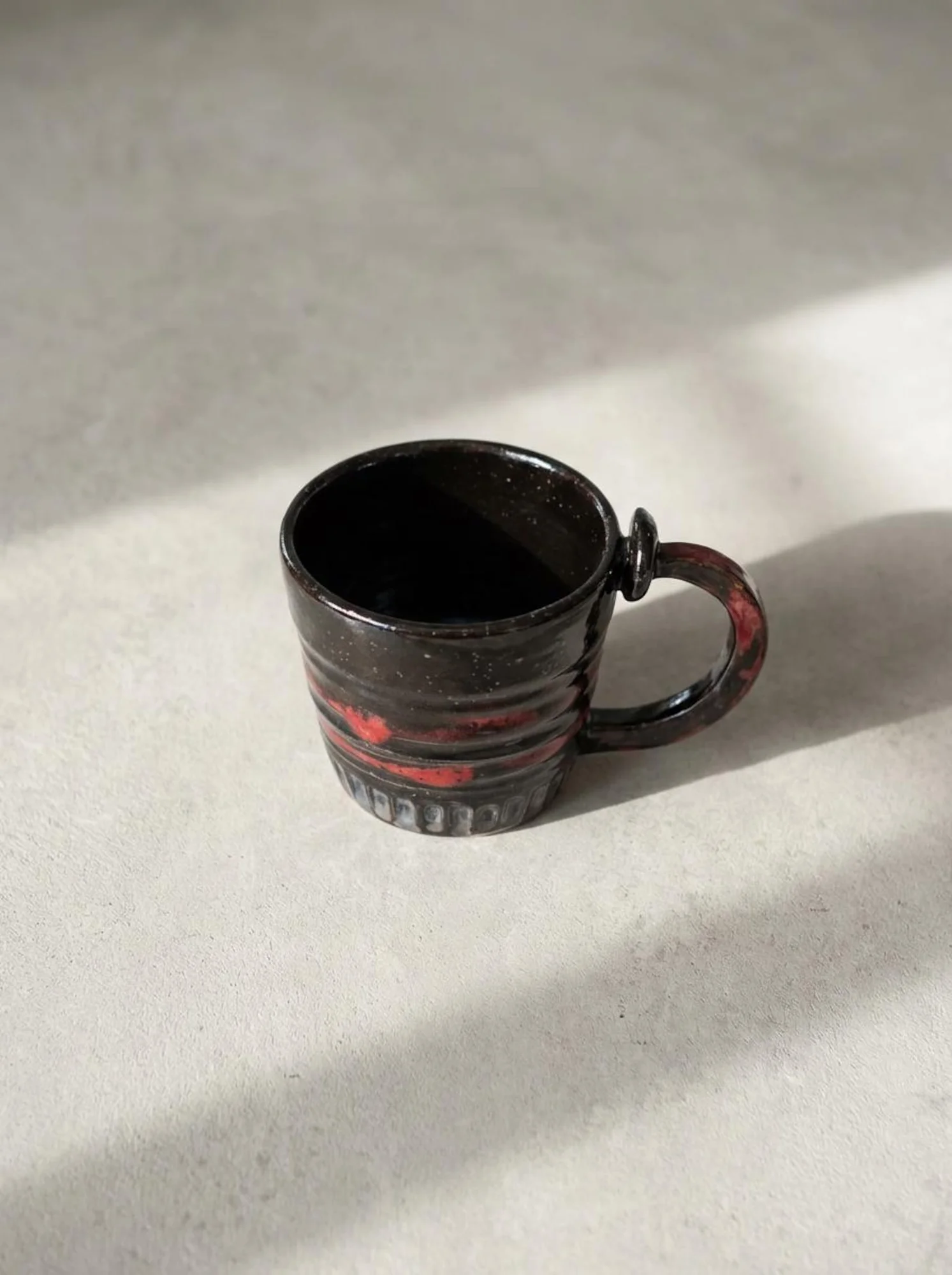 Black Lava Red Accent Mug - detail view