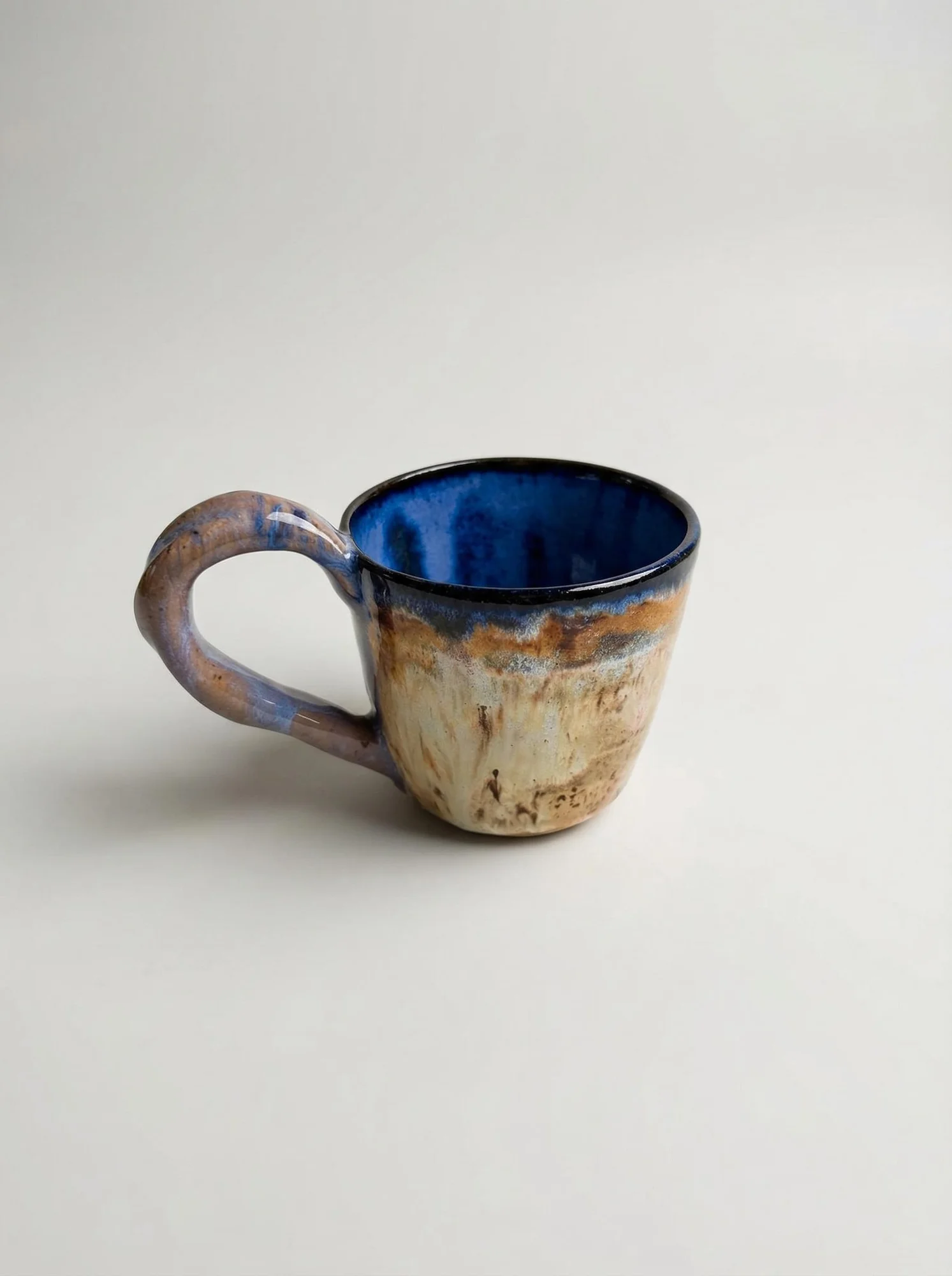 Blue Rim Earth Tone Drip Mug - side view