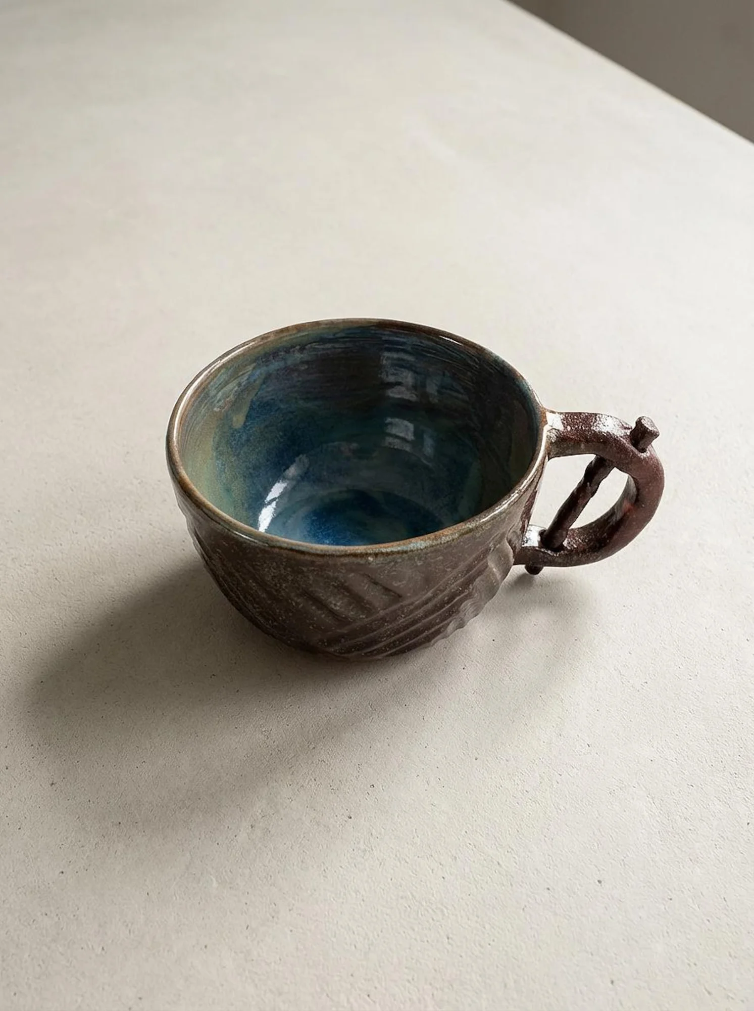 Dark Brown Carved Mug - front view