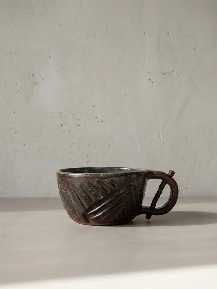 Dark Brown Carved Mug - side view