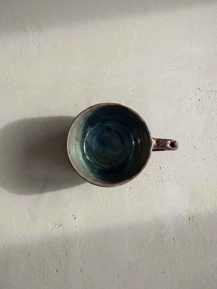 Dark Brown Carved Mug - detail view