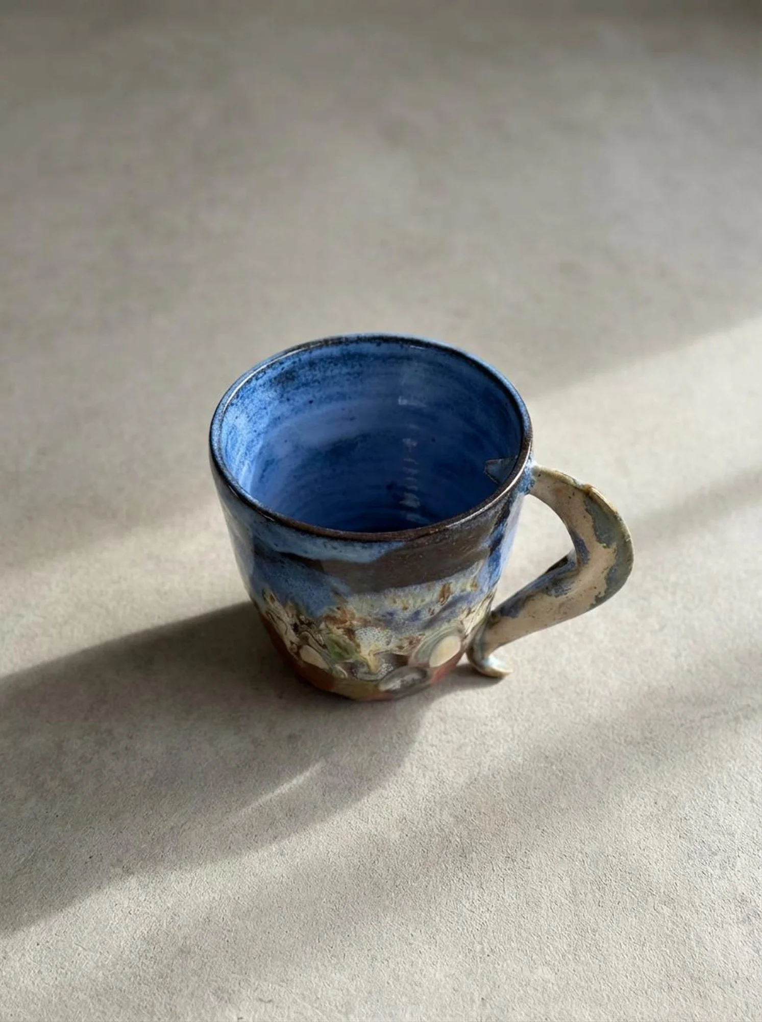 Mountain Glaze Sculpted Handle Mug - detail view