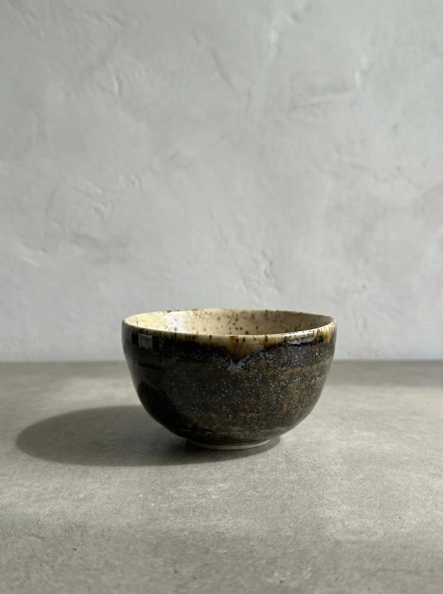 Speckled Cream Stone Tea Cup - side view