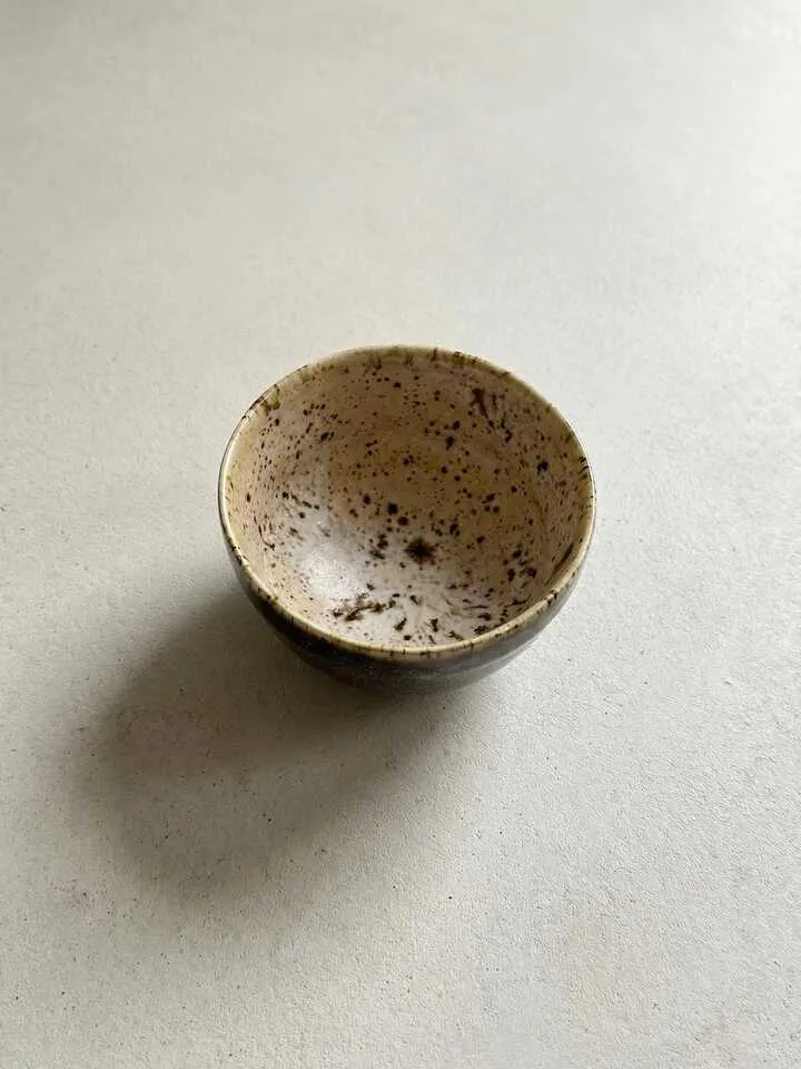 Speckled Cream Stone Tea Cup - front view