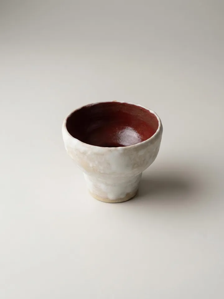 White Pedestal Red Interior Cup - front view